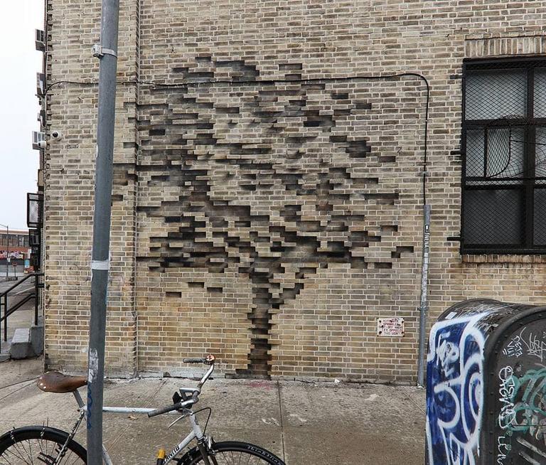 Художник создал оптическую иллюзию на стене дома, не вытащив при этом ни одного кирпича