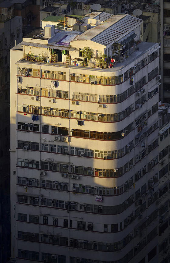 Я фотографирую людей, которые живут на крышах Гонконга. Это так захватывающе... Это целый мир!