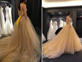 Невеста примерила 9 свадебных платьев, прежде чем найти подходящее и единственное в своем роде платье с жемчужными пуговицами